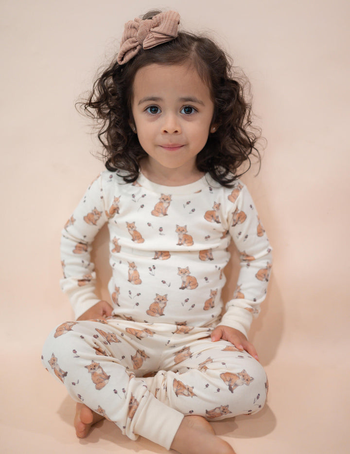 Child wearing Kids' Organic L/Sleeve PJ Set in Red Fox.