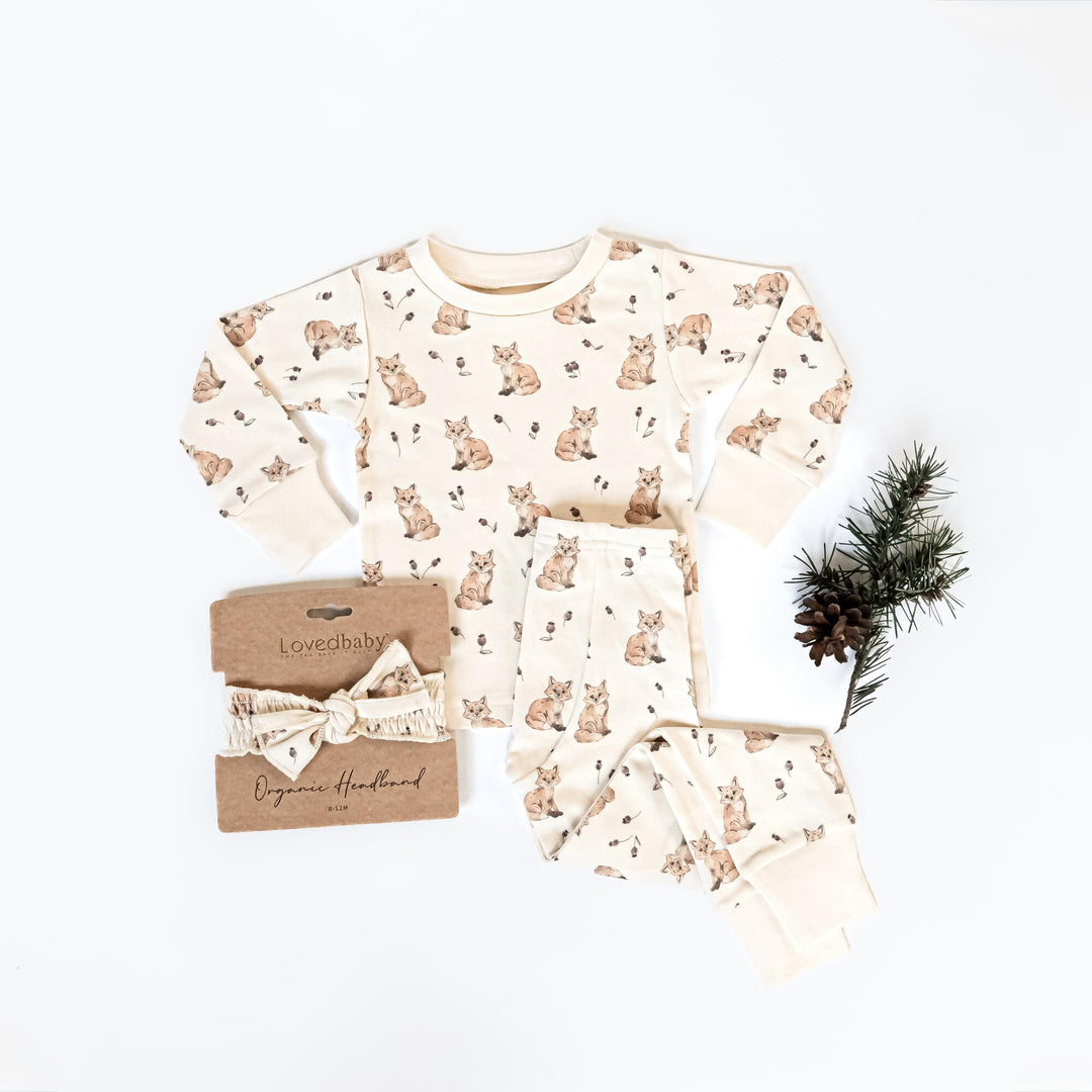 Child wearing Kids' Organic L/Sleeve PJ Set in Red Fox.