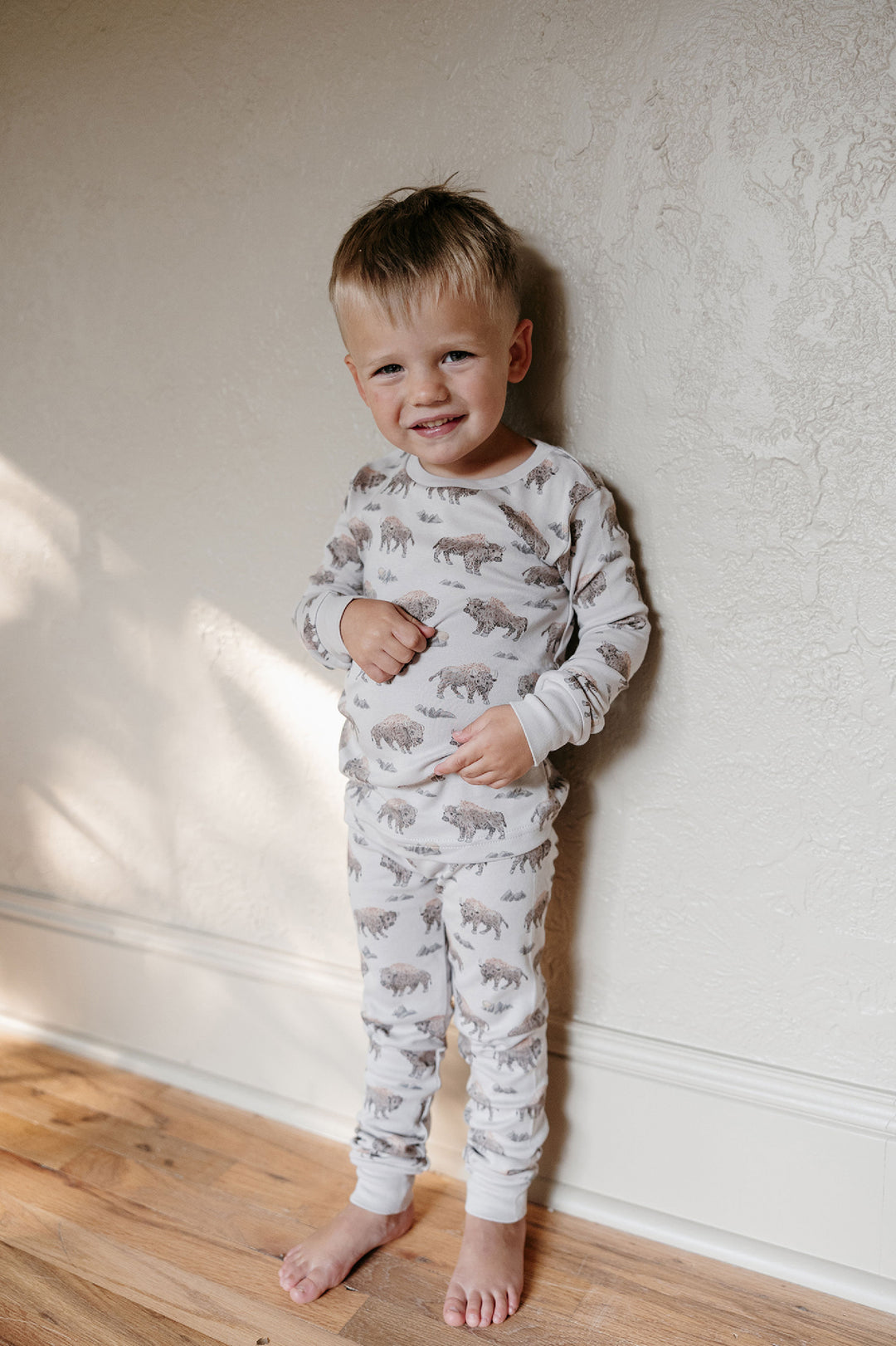 Child wearing Kids' Organic L/Sleeve PJ Set in Bison.