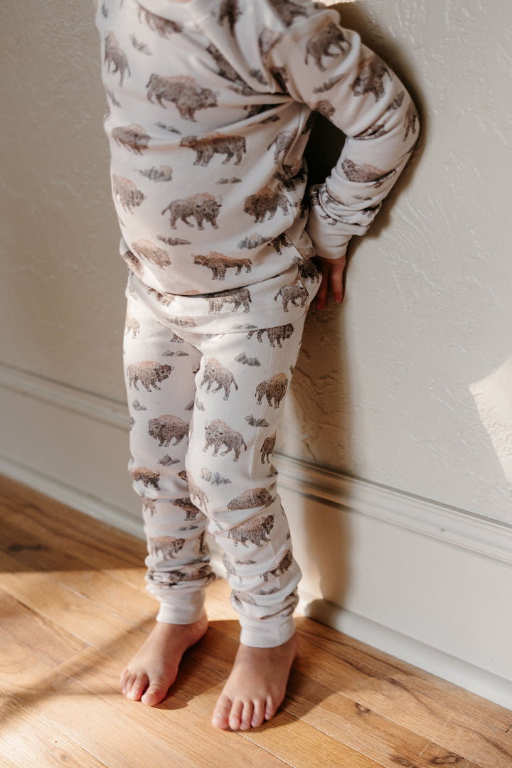 Child wearing Kids' Organic L/Sleeve PJ Set in Bison.