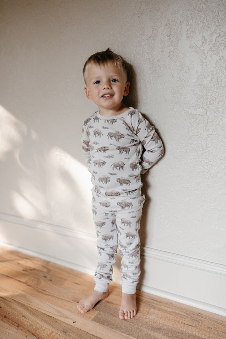 Child wearing Kids' Organic L/Sleeve PJ Set in Bison.