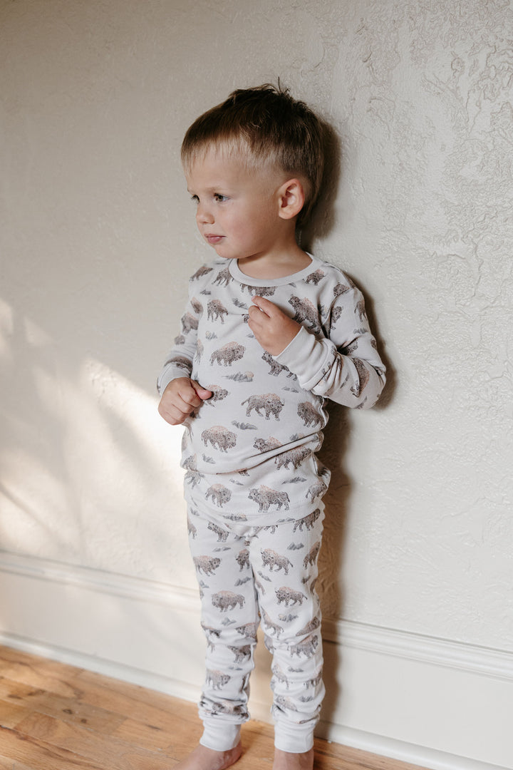 Child wearing Kids' Organic L/Sleeve PJ Set in Bison.