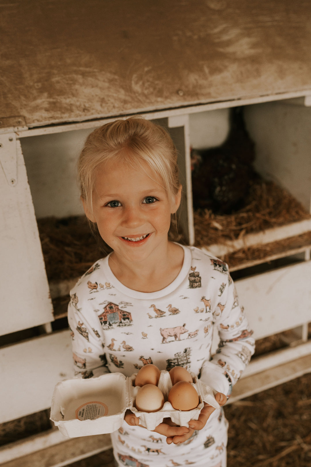 Child wearing Kids' Organic L/Sleeve PJ Set in Farm Friends.