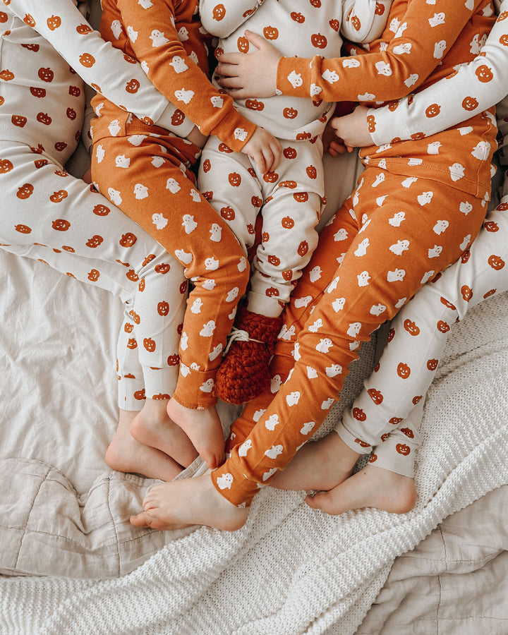 Child wearing Kids' Organic L/Sleeve PJ Set in Ghosts.