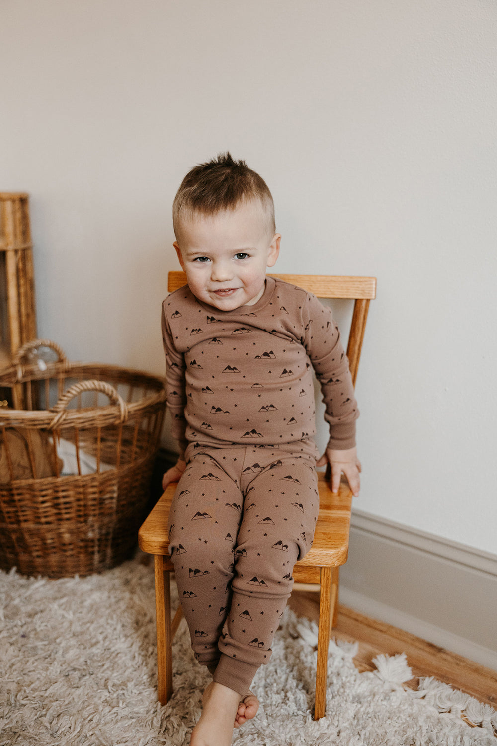 Child wearing Kids' Organic L/Sleeve PJ Set in Latte Mountain.