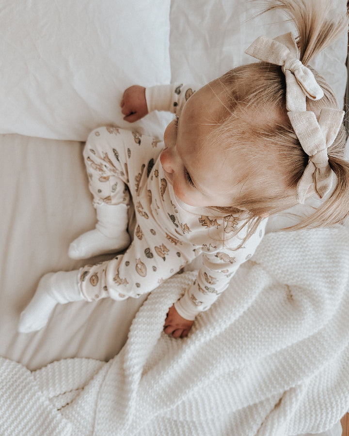 Child wearing Kids' Organic L/Sleeve PJ Set in Little Fox.