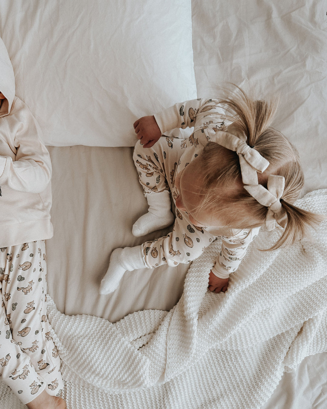 Child wearing Kids' Organic L/Sleeve PJ Set in Little Fox.