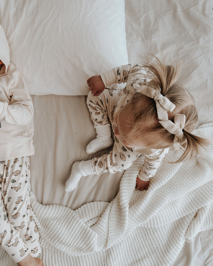Child wearing Kids' Organic L/Sleeve PJ Set in Little Fox.