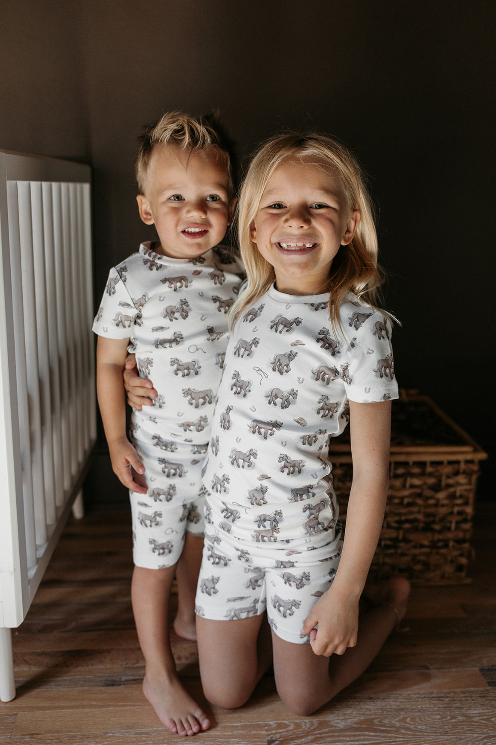Child wearing Kids' Organic Short-Sleeve PJ Set in Little Lasso.