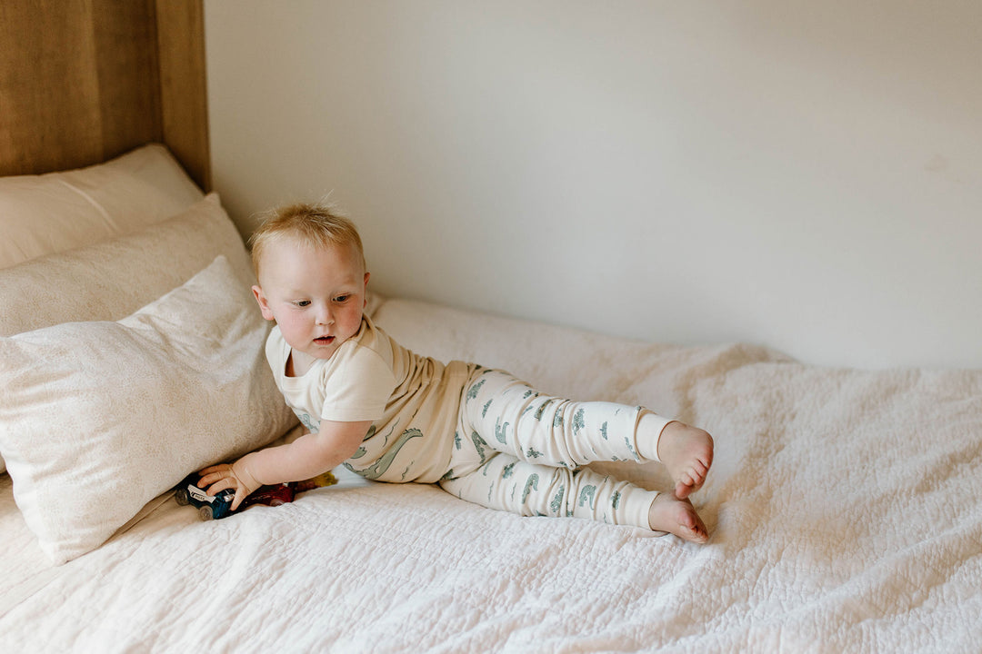 Child wearing Kids' Organic S/Sleeve PJ Set in Alligator.