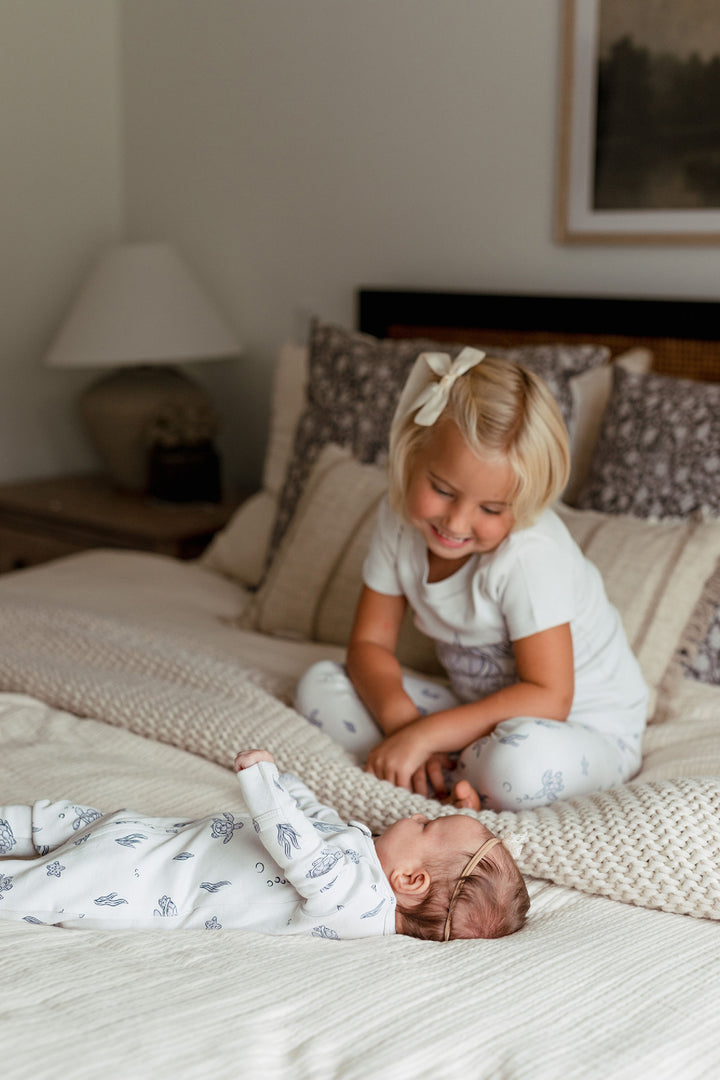Child wearing Kids' Organic S/Sleeve PJ Set in Sea Turtle.