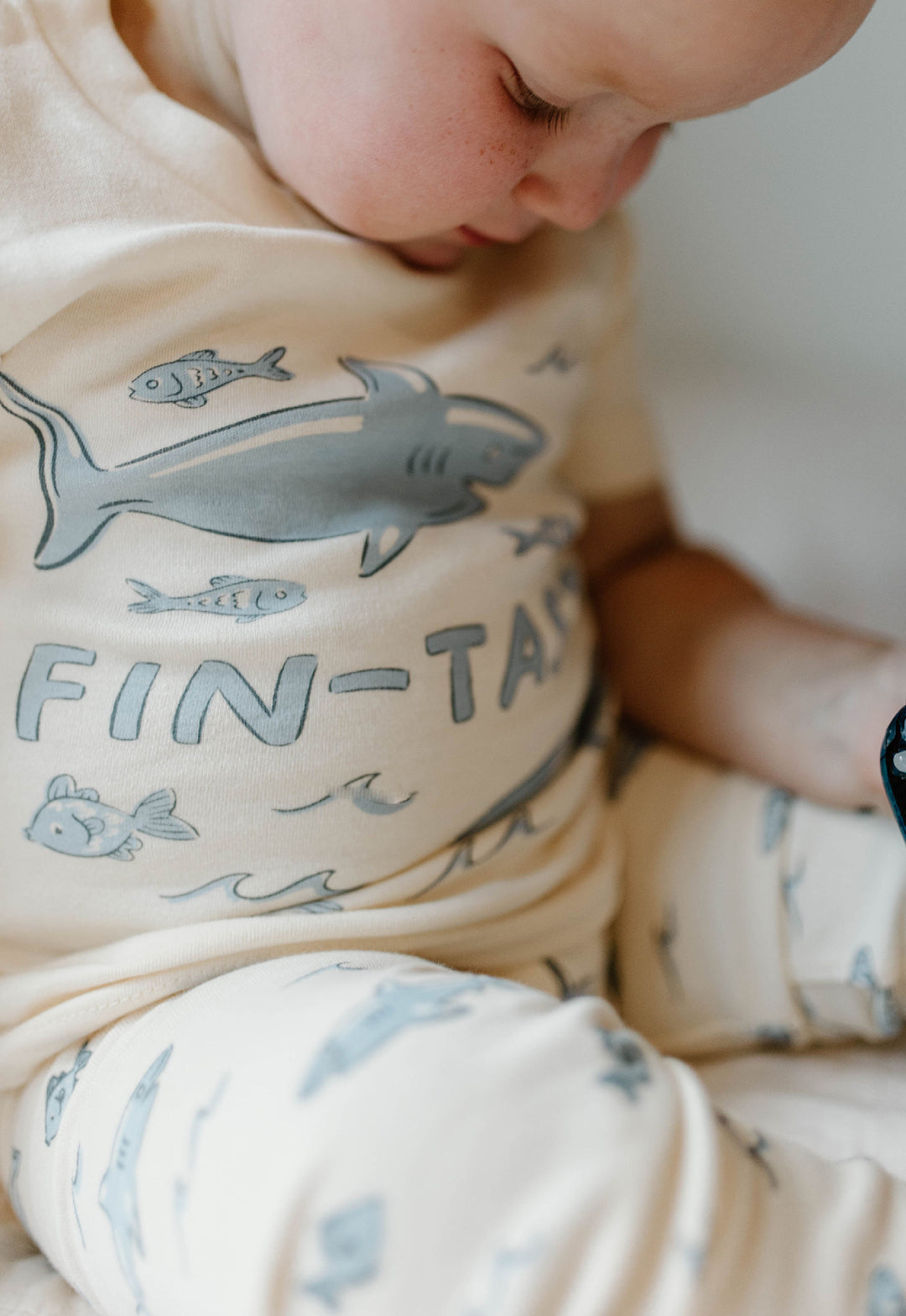Child wearing Kids' Organic S/Sleeve PJ Set in Shark.