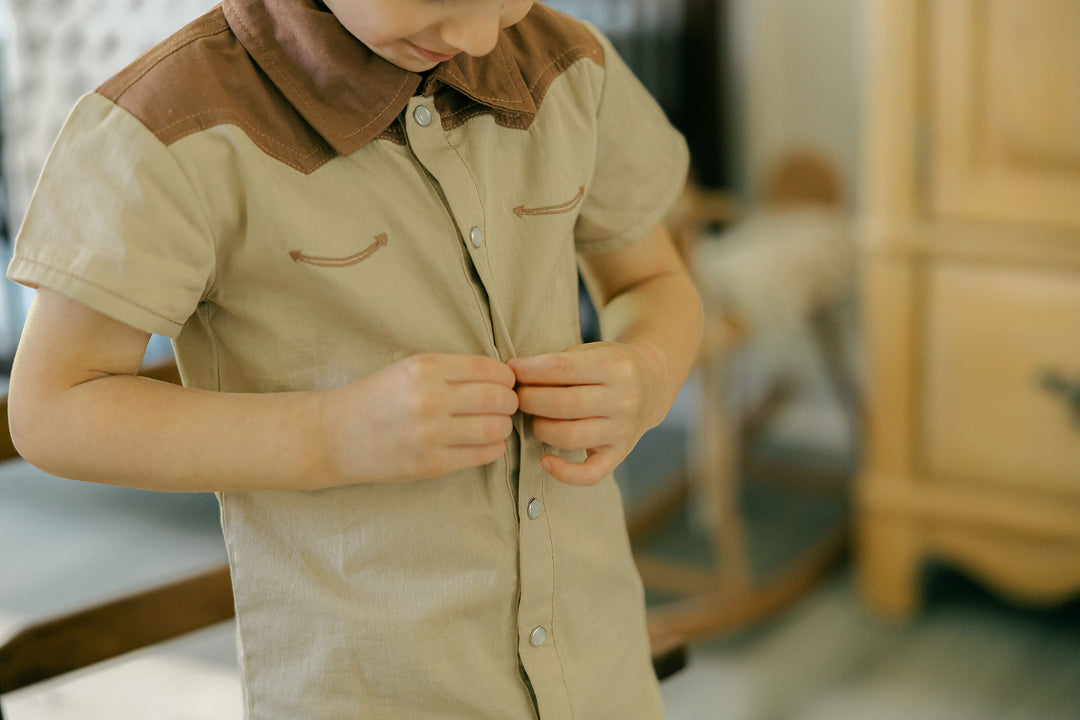Child wearing Kids' Western Button-Up Shirt in Oatmeal.