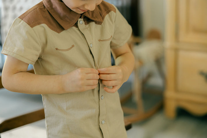 Child wearing Kids' Western Button-Up Shirt in Oatmeal.