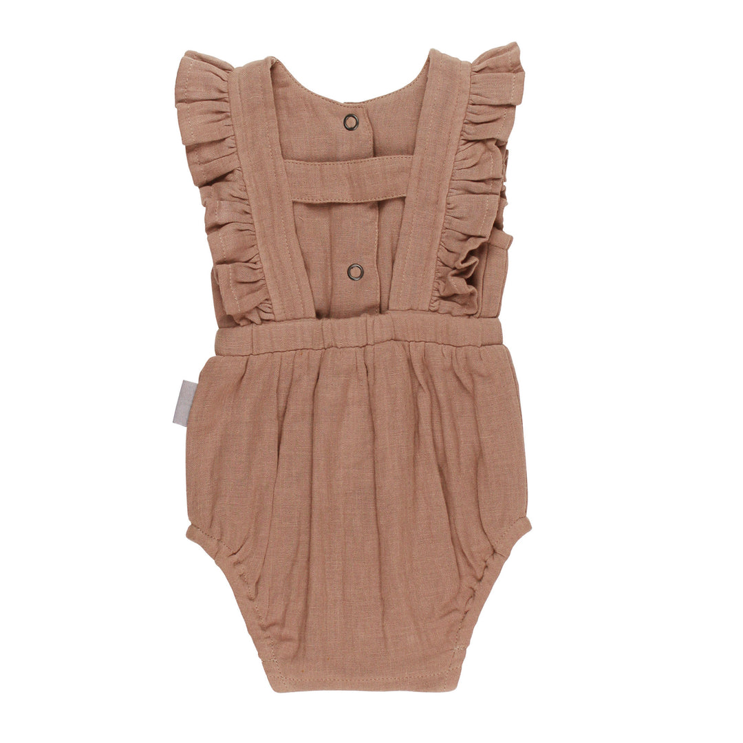 Back view of Organic Muslin Ruffle Bodysuit in Adobe, a tan clay color.