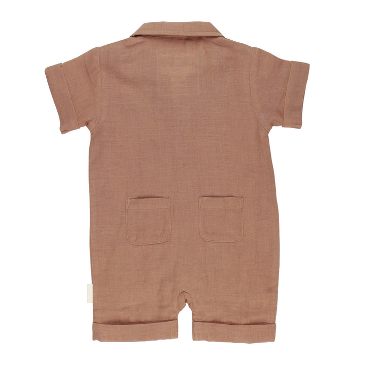 Back view of Organic Muslin S/Sleeve Coverall in Adobe, a tan clay color.