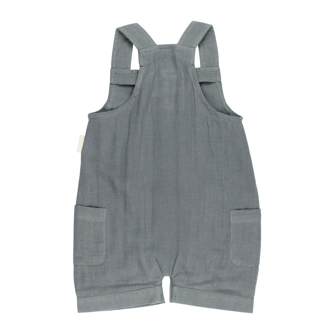 Back view of Organic Cuffed Muslin Overall in Moonstone, a gray blue color.