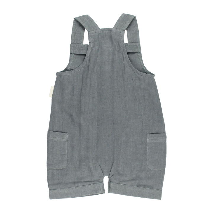 Back view of Organic Cuffed Muslin Overall in Moonstone, a gray blue color.
