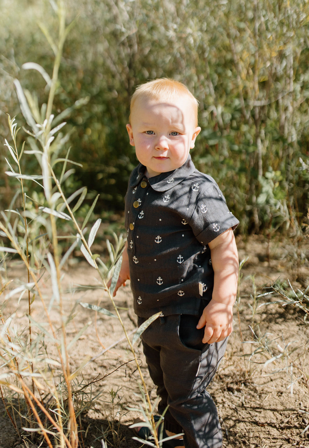 Child wearing Organic Muslin Tee & Harem Pant Set in Chia Anchor.