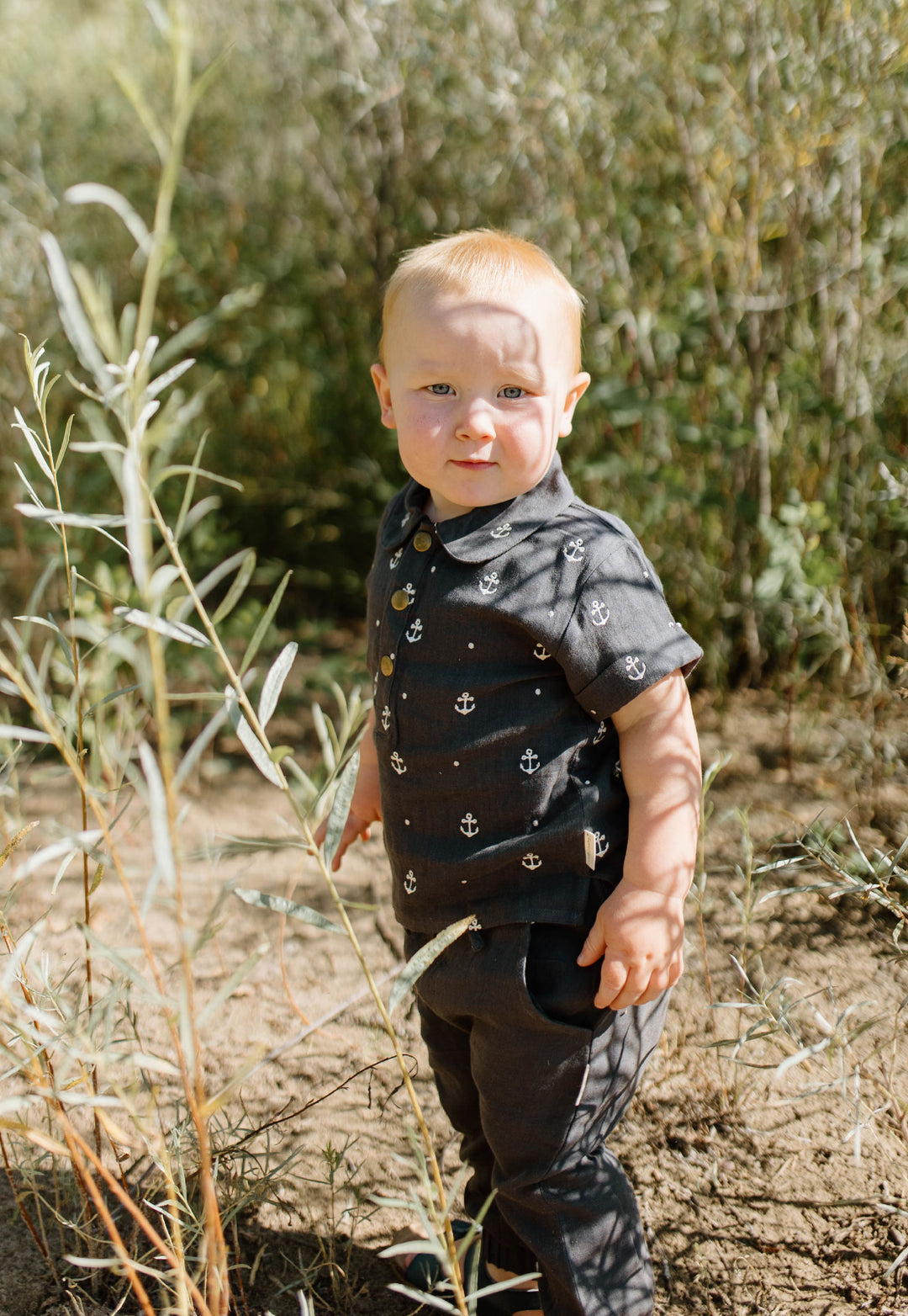Child wearing Organic Muslin Tee & Harem Pant Set in Chia Anchor.