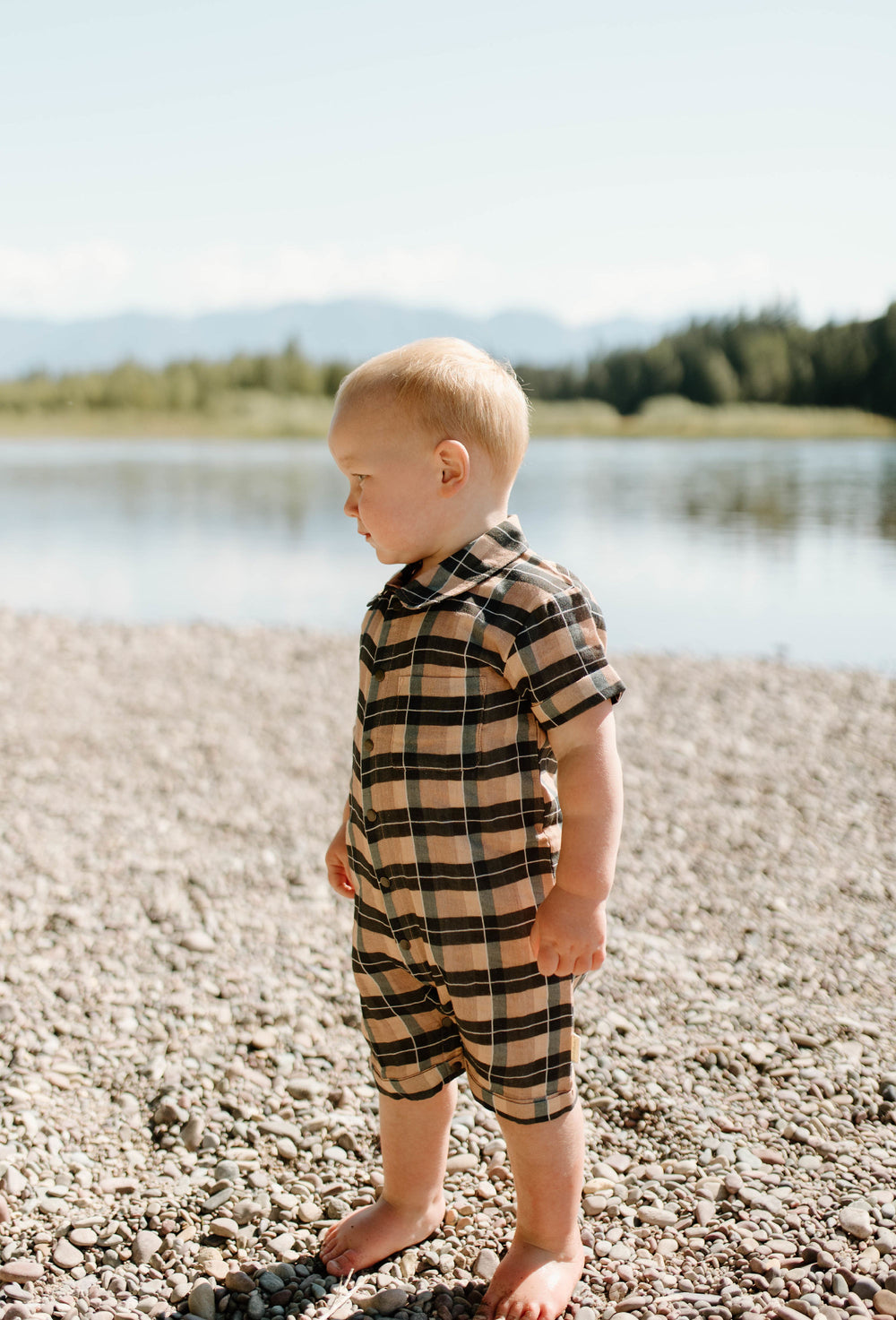 Child wearing Organic Muslin S/Sleeve Coverall in Adobe Chia Plaid.