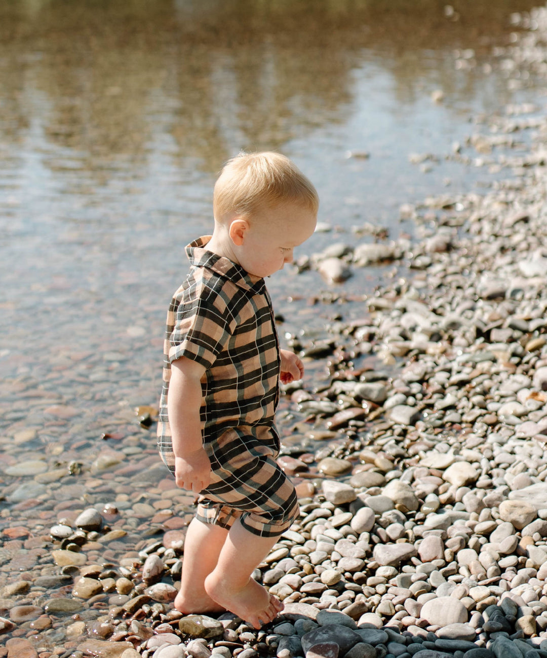 Child wearing Organic Muslin S/Sleeve Coverall in Adobe Chia Plaid.