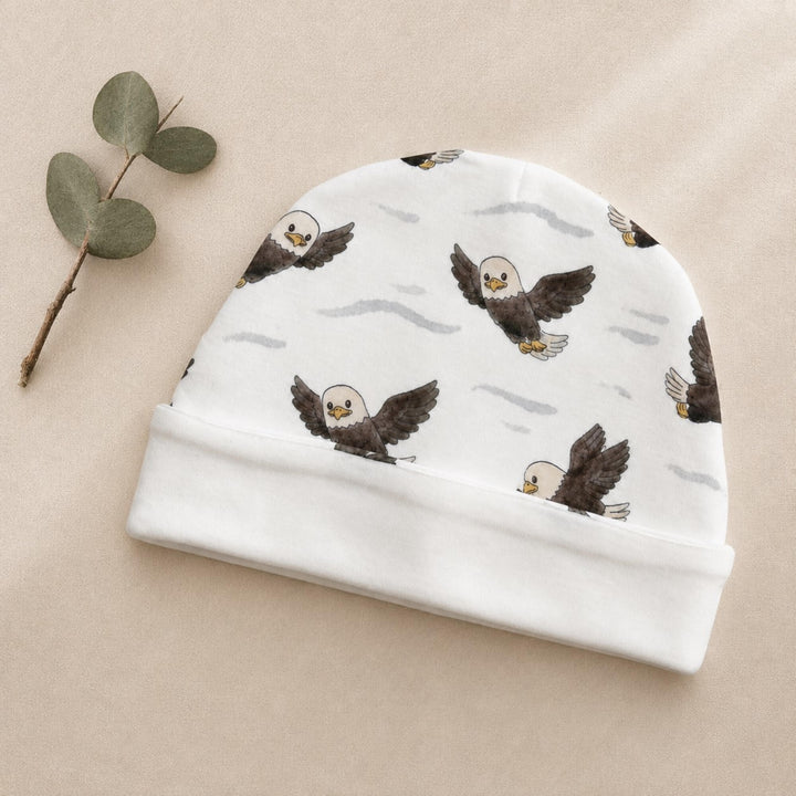 Child wearing Reversible Organic Beanie in Bald Eagle.