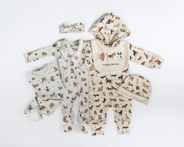 Child wearing Reversible Organic Beanie in Puppy Love.