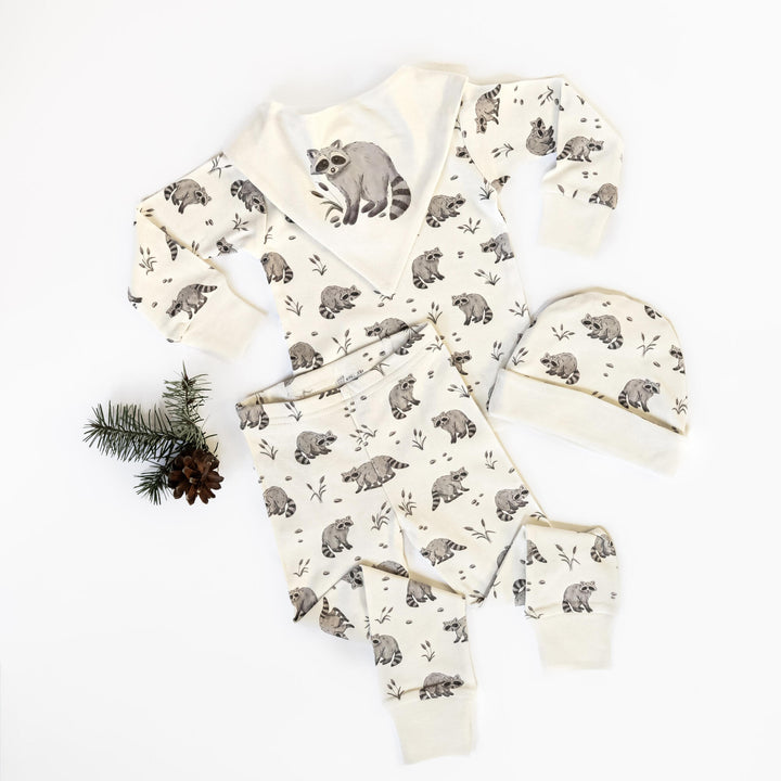 Child wearing Reversible Organic Beanie in Raccoon.