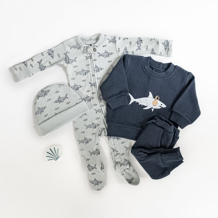 Child wearing Reversible Organic Beanie in Sharks.