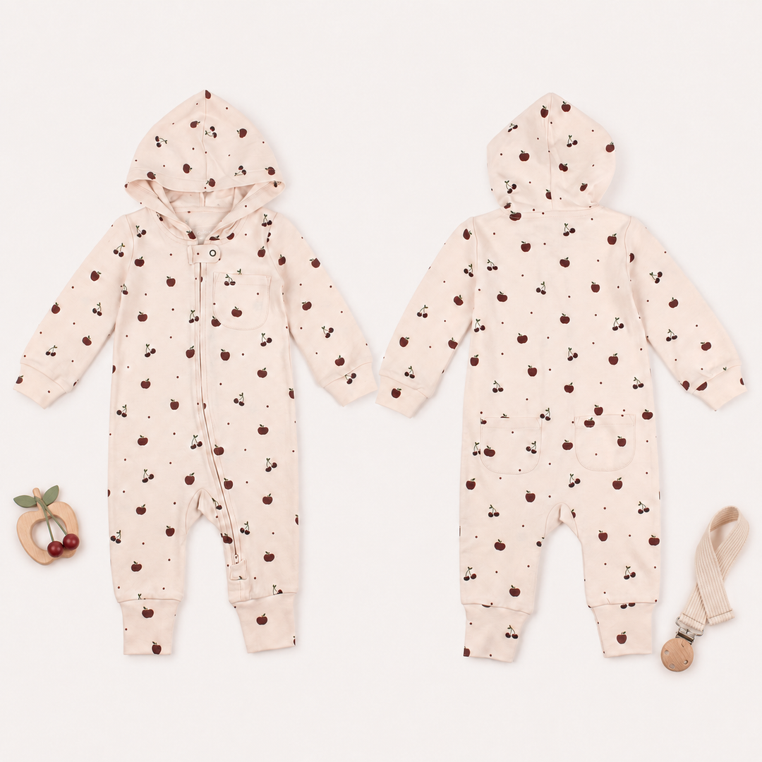 Styled flatlay of Organic Hooded Zipper Romper in Cherry Apple