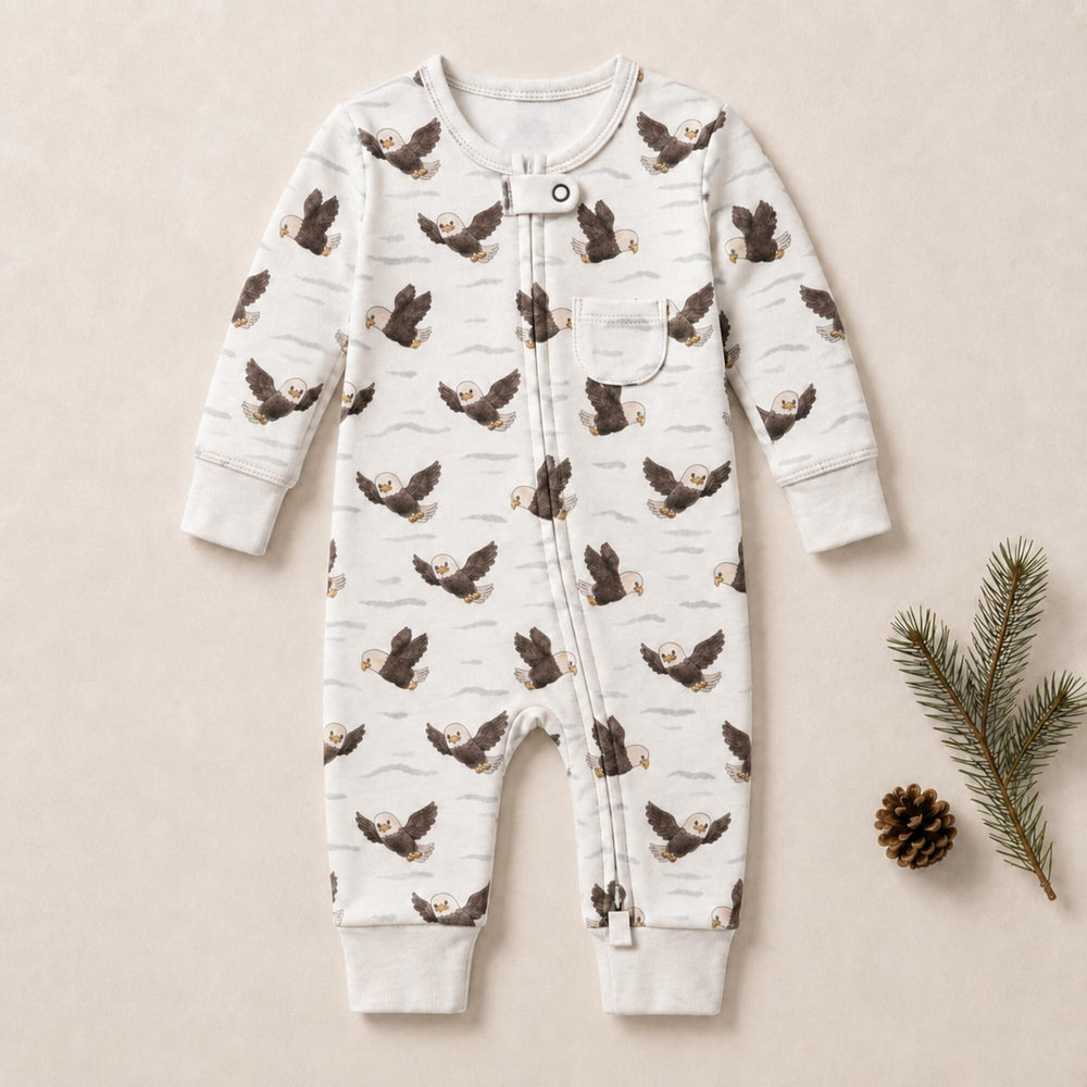 Child wearing Organic Footless 2-Way Zipper Romper in Bald Eagle.