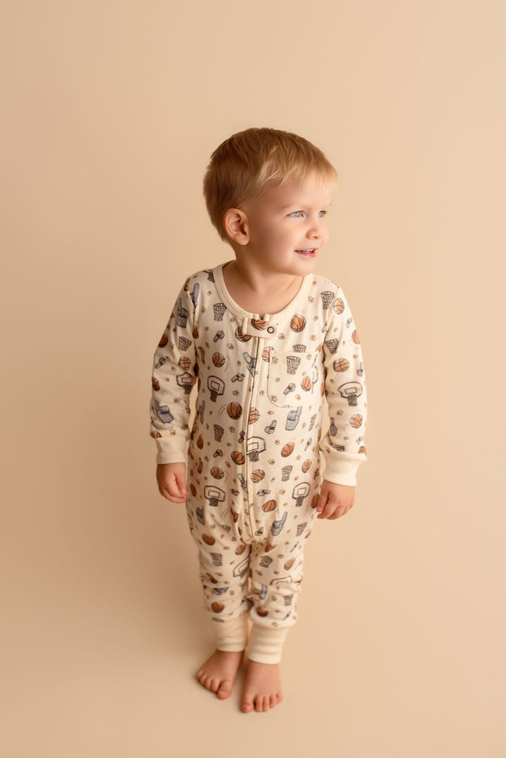 Child wearing Organic Footless 2-Way Zipper Romper in Hoops.
