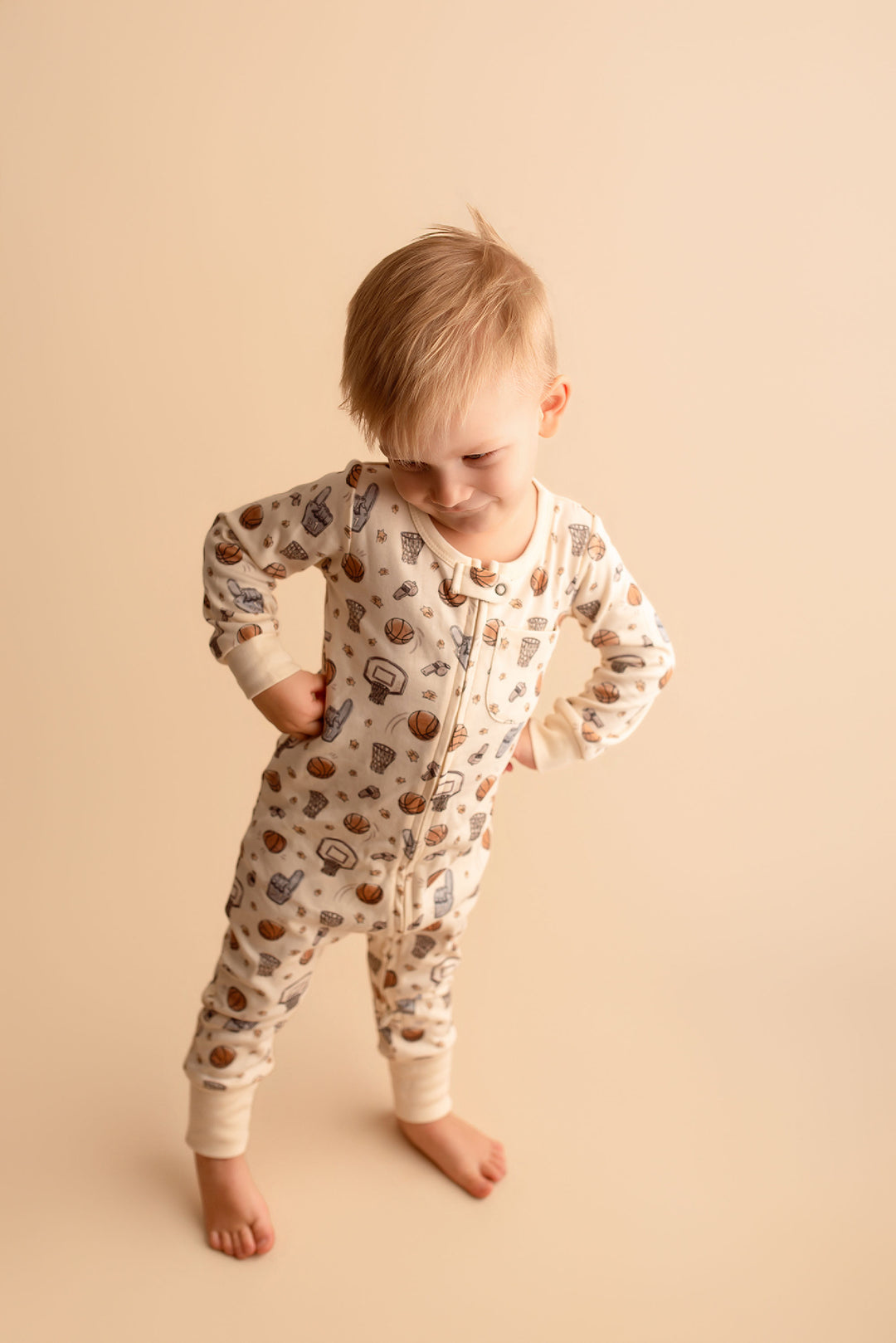 Child wearing Organic Footless 2-Way Zipper Romper in Hoops.