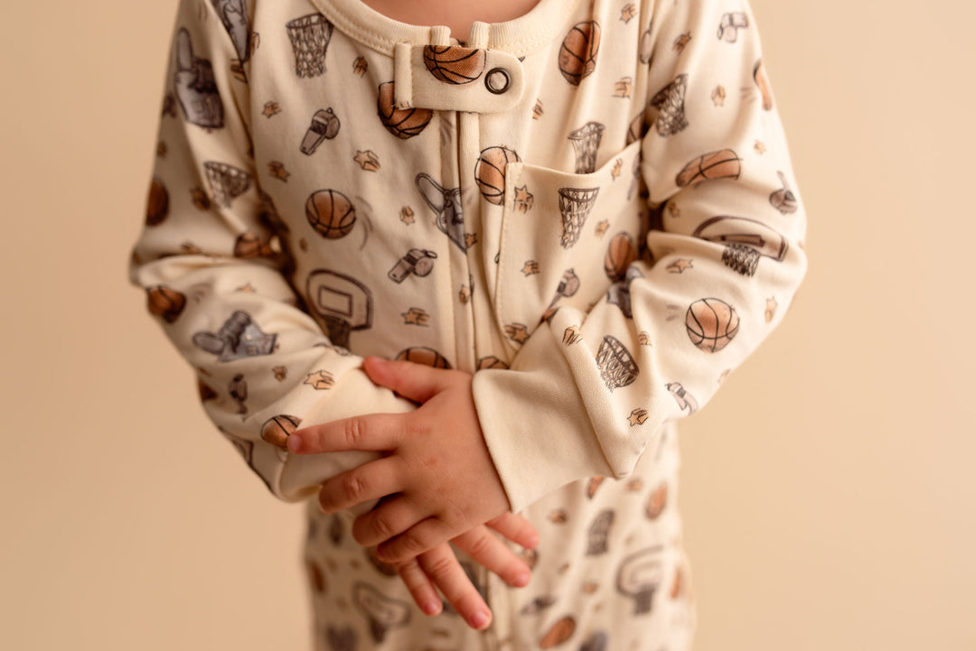 Child wearing Organic Footless 2-Way Zipper Romper in Hoops.