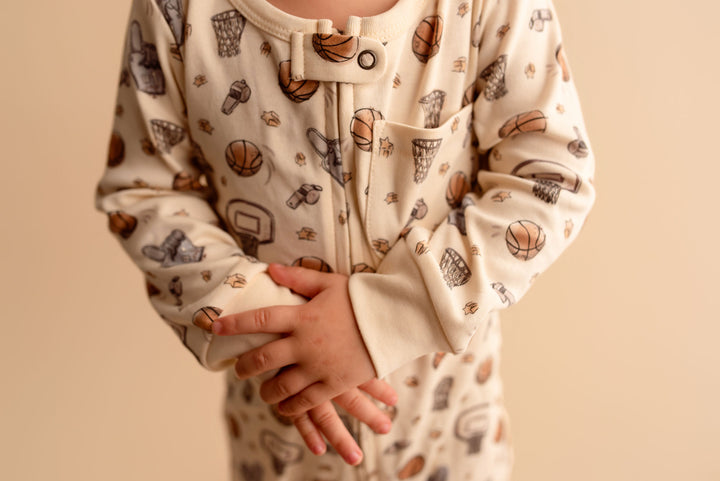 Child wearing Organic Footless 2-Way Zipper Romper in Hoops.