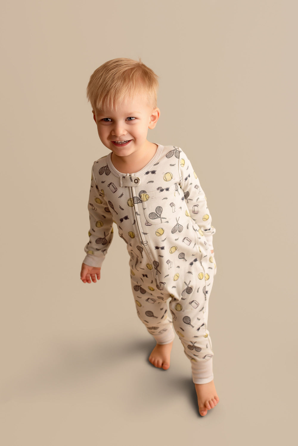 Child wearing Organic Footless 2-Way Zipper Romper in Little Ace.