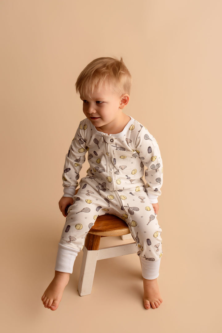 Child wearing Organic Footless 2-Way Zipper Romper in Little Ace.