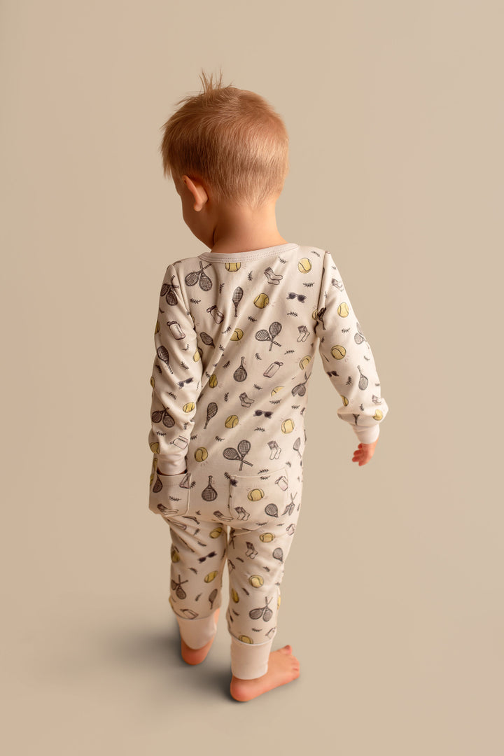 Child wearing Organic Footless 2-Way Zipper Romper in Little Ace.