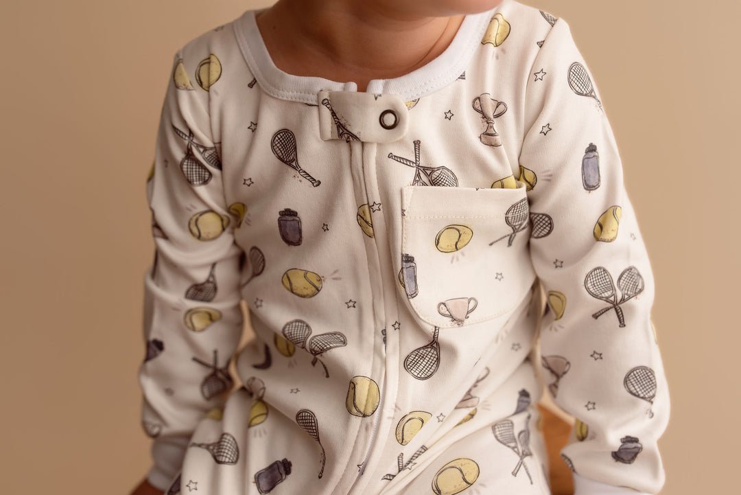 Child wearing Organic Footless 2-Way Zipper Romper in Little Ace.