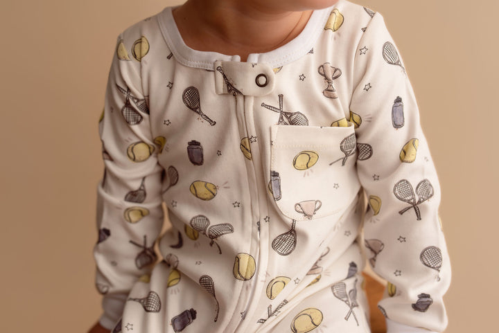 Child wearing Organic Footless 2-Way Zipper Romper in Little Ace.