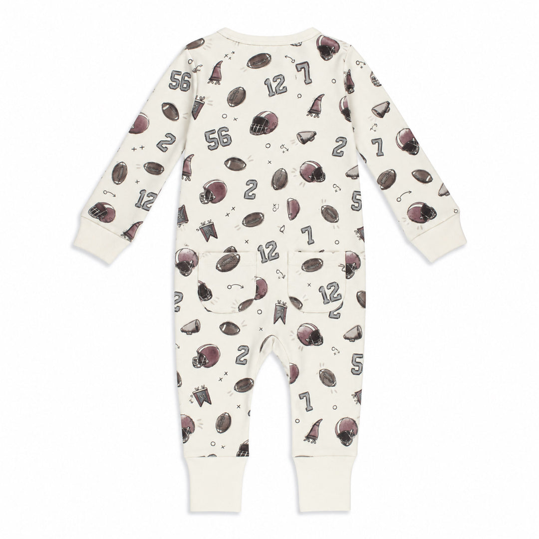 Styled flatlay of Organic Footless 2-Way Zipper Romper in Touchdown.
