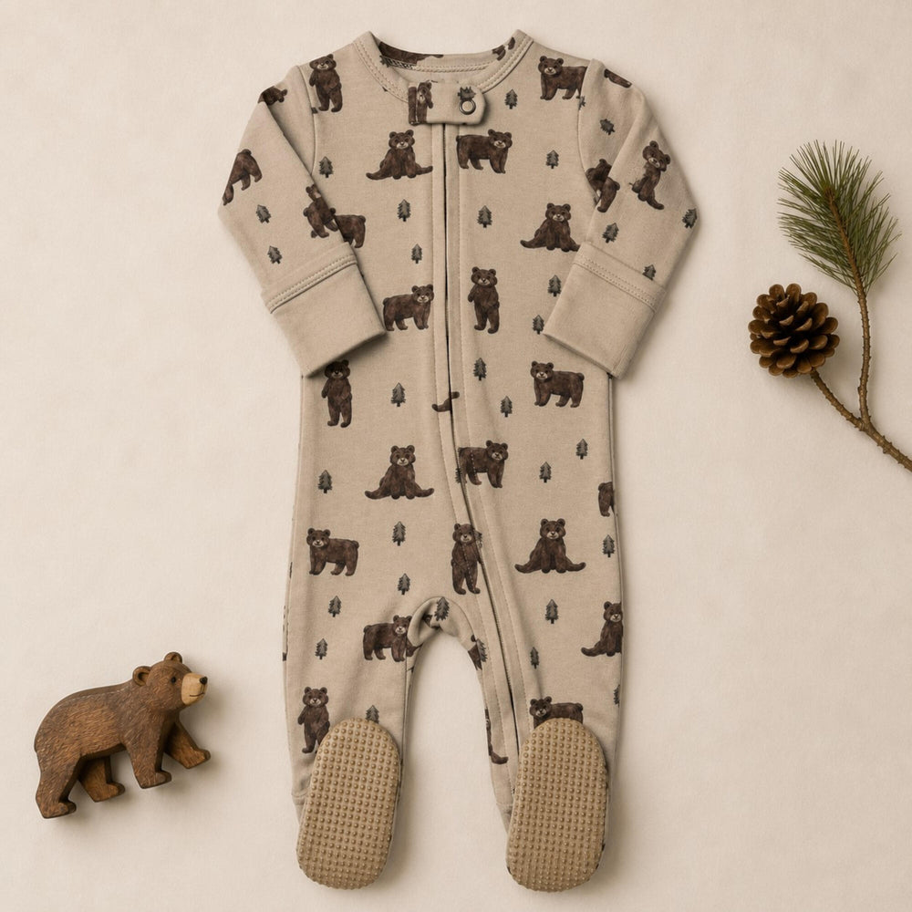 Child wearing Organic 2-Way Zipper Footie in Black Bear.