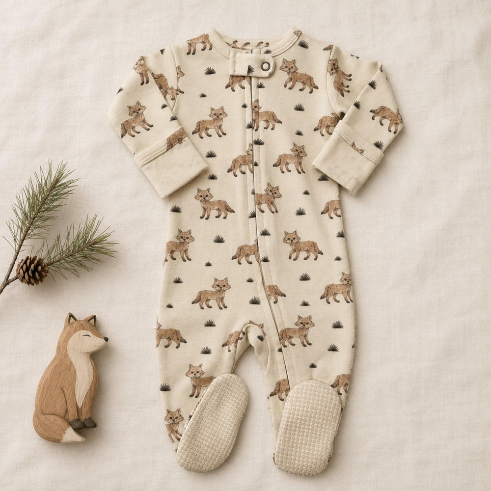 Child wearing Organic 2-Way Zipper Footie in Coyote.