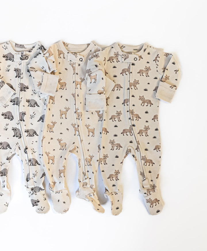 Child wearing Organic 2-Way Zipper Footie in Coyote.