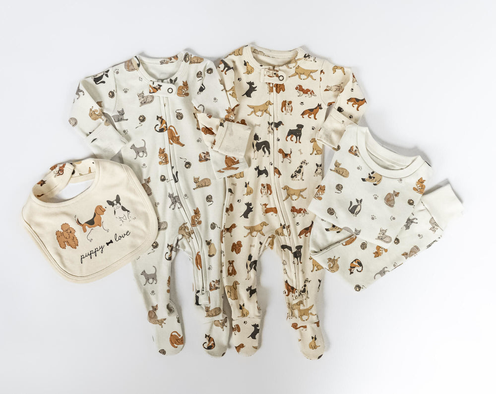 Child wearing Organic 2-Way Zipper Footie in Puppy Love.