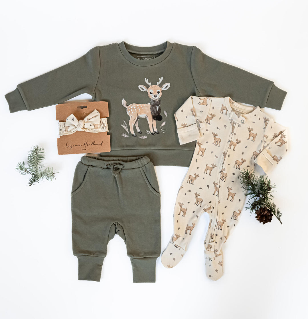 Child wearing Organic 2-Way Zipper Footie in White Tail Deer.