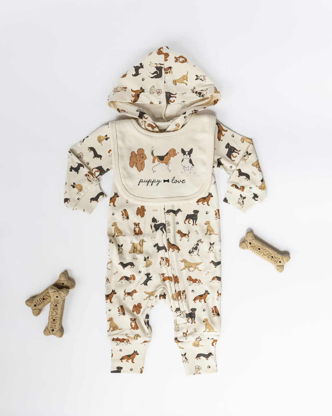 Child wearing Organic Reversible Bib in Puppy Love.