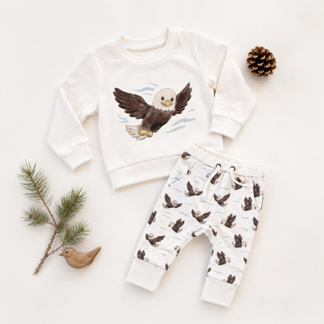 Child wearing Organic Sweatshirt & Jogger Set in Bald Eagle.