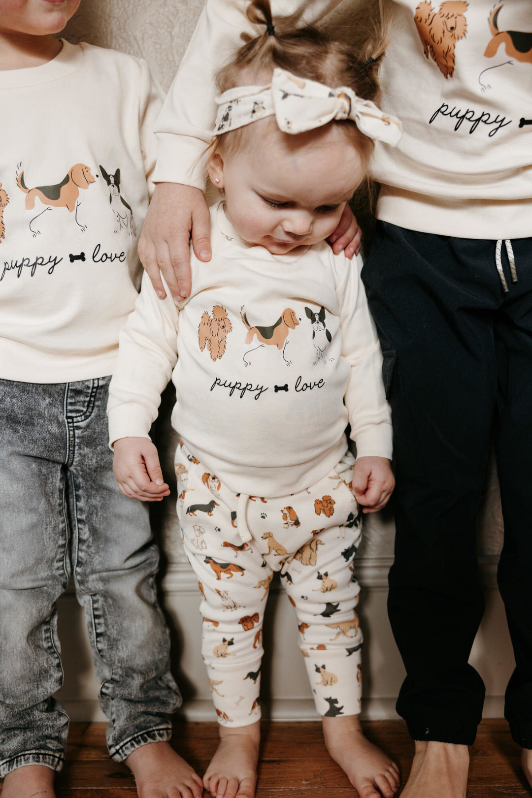 Child wearing Organic Sweatshirt & Jogger Set in Puppy Love.